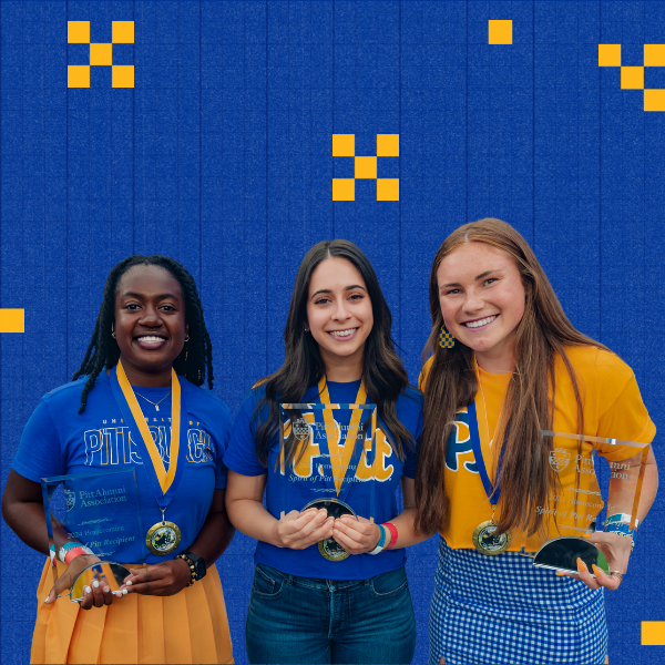 students holding awards