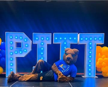 ROC in front of Pitt sign